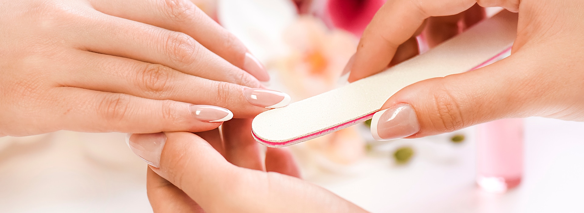 Woman,Beautician,Using,A,Nail,File.,Professional,And,Beautiful,Hands